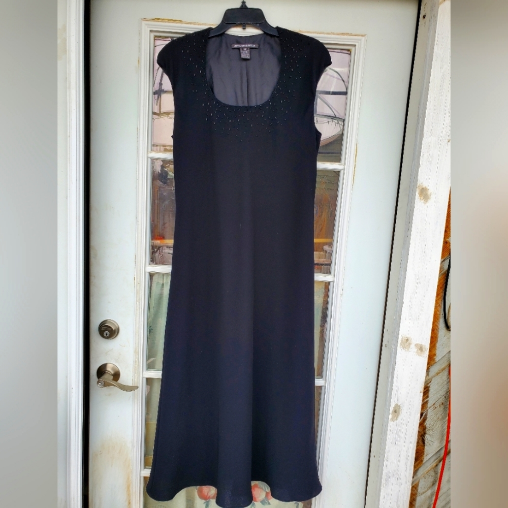Black Sleevelse's evening dress by Jones Wear. Sz16.